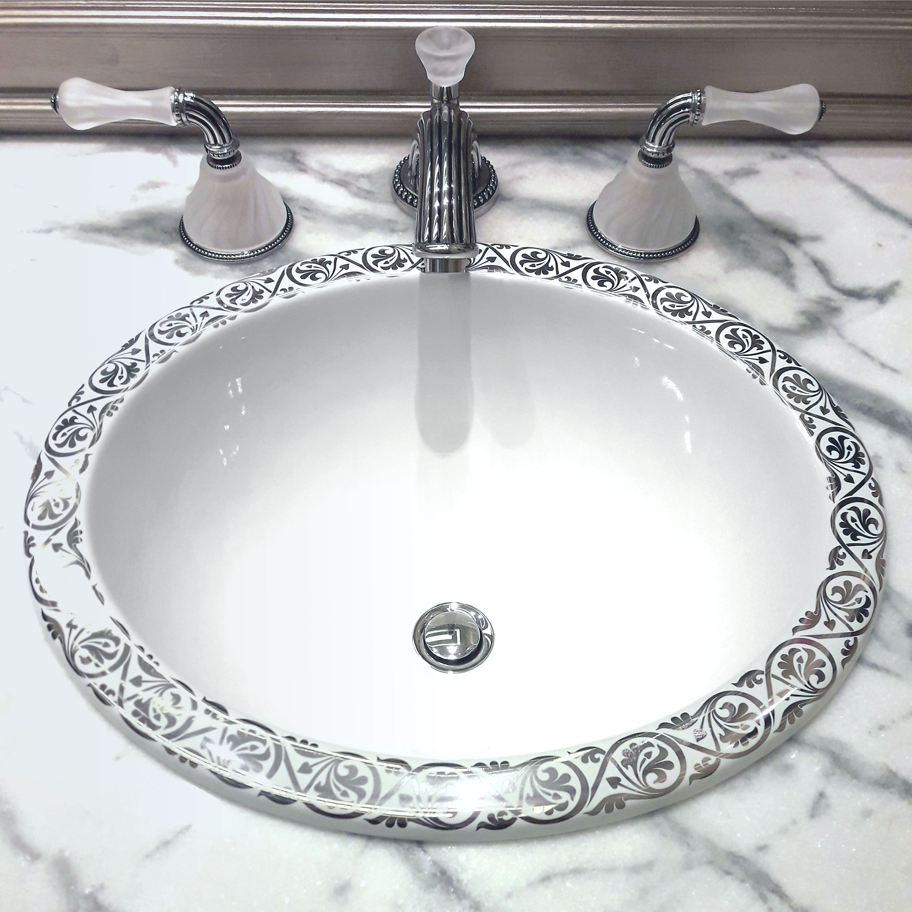 platinum border sink in marble counter