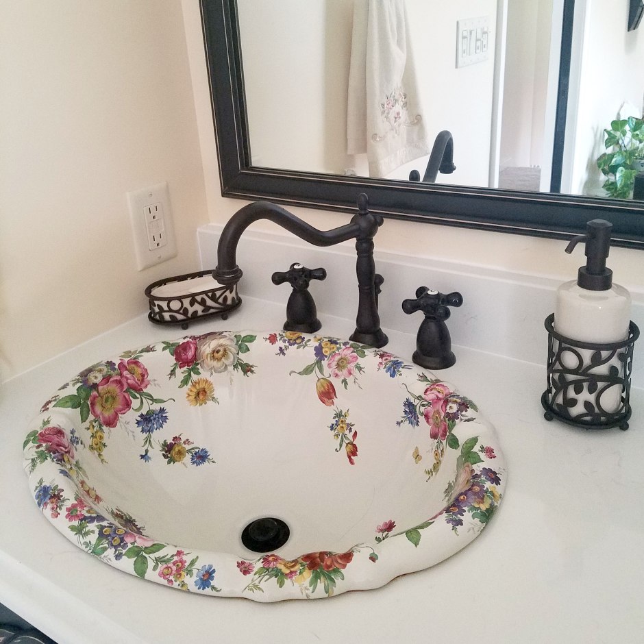 floral painted sink in master bathroom